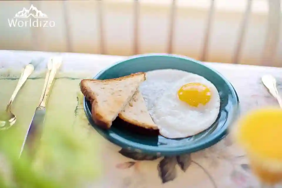 Egg and bread in plate